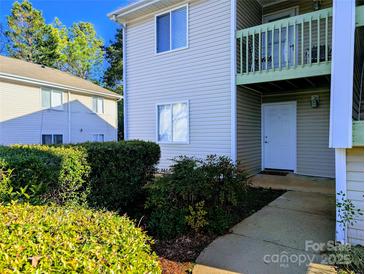 Inviting condo exterior with charming landscaping and a well-maintained facade at 1056 Latham Ct # B104, Rock Hill, SC 29732