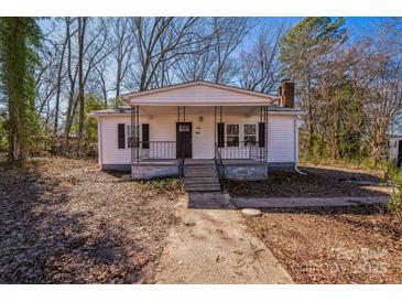 Charming single-story home featuring a cozy front porch and classic architectural details at 1229 Jenkins St, Rock Hill, SC 29732