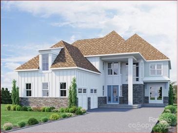 Stunning new construction home featuring stone accents and a three car garage at 4507 Morning Mist Dr # 208, Sherrills Ford, NC 28673