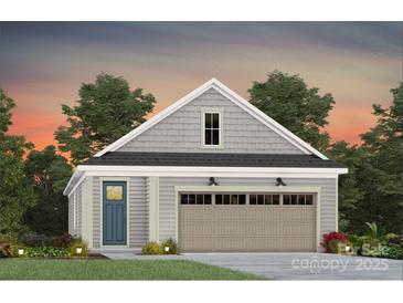 Charming single-car garage with gray shake siding and carriage door at 1614 Shoals Ave # 151, Belmont, NC 28012
