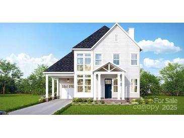 Charming two-story home with a welcoming front porch and manicured lawn at 7398 Deer Hollow Rd # 28, Sherrills Ford, NC 28673