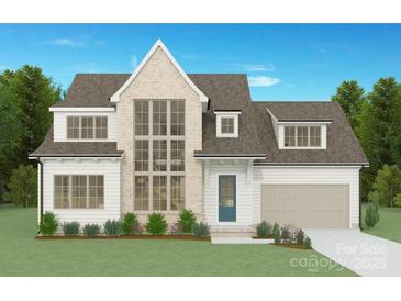 Charming two-story home with large windows, a brick facade, and a well-manicured lawn at 4801 Elder Ave, Charlotte, NC 28205