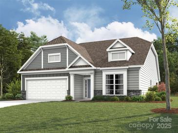 Charming home featuring a mix of gray and white siding, complemented by a well-manicured lawn and inviting curb appeal at 2210 Camber Dr # Cwo0075, Gastonia, NC 28054