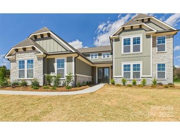 Beautiful new construction home with stone accents and craftsman-style details at 1010 Rolling Meadows Dr # Rm14, Mooresville, NC 28115