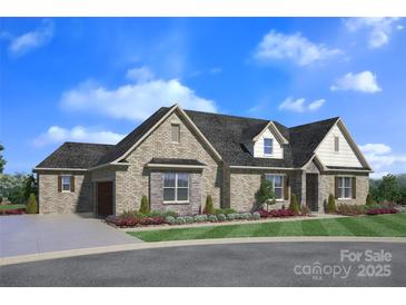 Charming single-story brick home with a well-manicured lawn and inviting curb appeal at 2069 Landry Ln # 233, Rock Hill, SC 29732