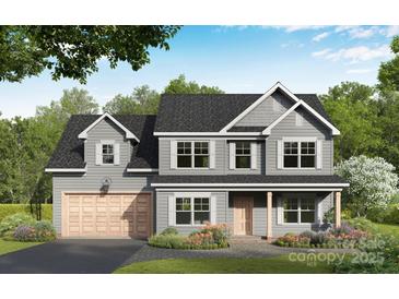 Charming two-story home featuring a craftsman style, gray siding, covered entry, and two-car garage at 1146 Nations Dr, Charlotte, NC 28217