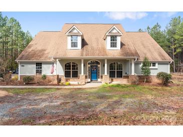 Charming single Gathering home features an inviting front porch with stone accents at 1485 Sierra Rd, York, SC 29745