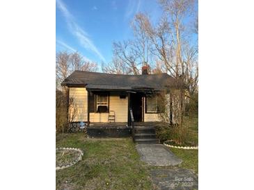 Charming single-story home featuring a covered porch and a classic architecture at 233 Poag St, Rock Hill, SC 29730