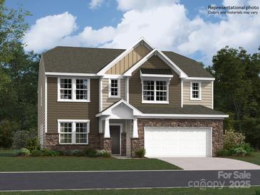 New two-story home featuring stone accents, a two-car garage, and neutral color palette at 6265 Fairfax Ct, Maiden, NC 28650