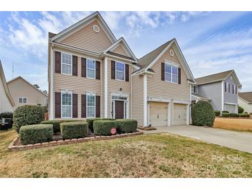 Charming two-story home featuring a two-car garage and well-maintained landscaping at 4118 Caldwell Ridge Pkwy, Charlotte, NC 28213