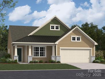 Charming one-story home with a covered porch, two-car garage, and landscaped front yard at 8418 Norman Forest Rd, Lancaster, SC 29720