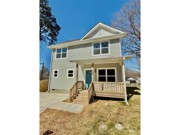 Charming two-story home with a light blue exterior and inviting front porch at 620 Granite Ave, Gastonia, NC 28052