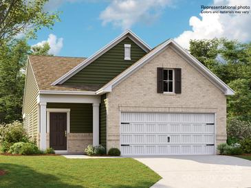 Charming single-Gathering home featuring a two-car garage and a welcoming front porch with stylish accents at 8436 Norman Forest Rd, Lancaster, SC 29720
