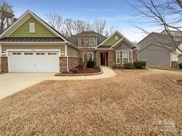 Charming single-Gathering home with a well-manicured front yard and inviting curb appeal at 13217 Reunion St, Charlotte, NC 28278