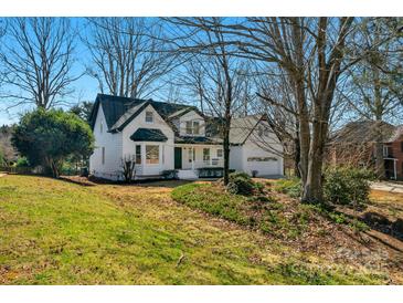 Charming two-story home with a landscaped front yard and attached two-car garage at 1517 Rice Hope Ct, Gastonia, NC 28056