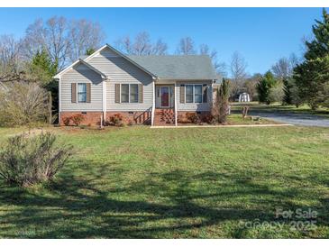 Charming single-Gathering home with a well-manicured front yard, inviting curb appeal, and a classic design at 2520 Foxworth Dr, Monroe, NC 28110