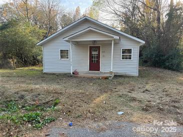 Cozy one-story home featuring a covered front porch at 1612 Carter Rd, Lancaster, SC 29720