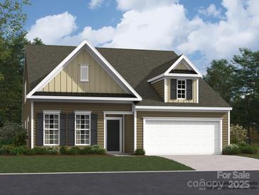 Charming one-story home with a two-car garage, neutral siding, black shutters and a well-manicured lawn at 2814 Morning Song Way, Lancaster, SC 29720