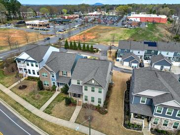 Aerial view of well-maintained homes in a suburban neighborhood, near shopping and dining at 117 Stowe Rd, Belmont, NC 28012