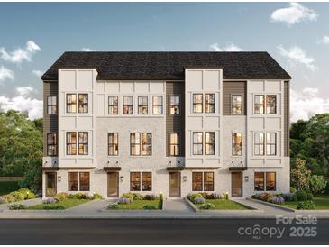 Beautifully appointed townhomes in a lovely landscaped community with sidewalks and attractive exteriors at Lot 34 Old Pineville Rd, Charlotte, NC 28217