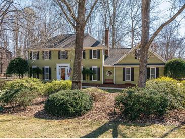 Charming two-story traditional home with manicured landscaping and a welcoming front entrance at 4301 Old Forge Dr, Gastonia, NC 28056