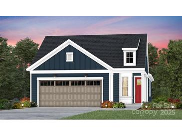 Charming home featuring blue siding, a dormer window and carriage garage doors at 1529 Pebble Shore Ln # 164, Belmont, NC 28012