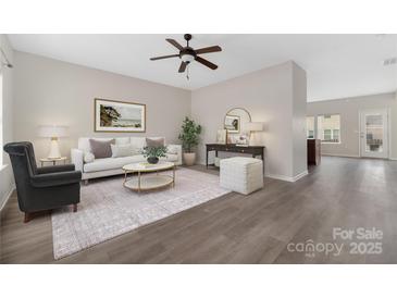 Bright living room with modern furnishings, neutral tones, and stylish decor at 1178 Valley St, Statesville, NC 28677