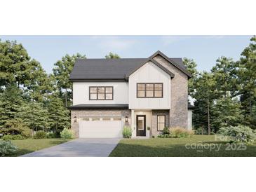 New construction featuring a two-story home with a brick and white siding exterior and attached garage at 00A Old Pardue Rd, Lancaster, SC 29720