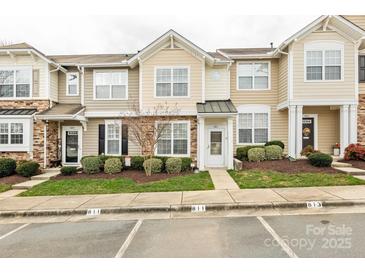 Charming townhomes featuring well-manicured lawns and neutral exteriors at 811 Gentlewinds Ct, Fort Mill, SC 29708