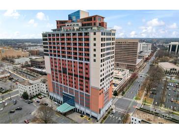 Striking high rise offers breathtaking city views and modern design at 222 S Caldwell St # 2008, Charlotte, NC 28202