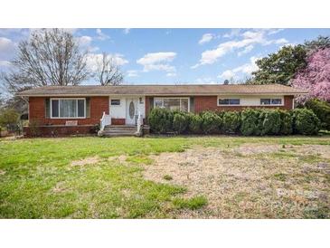 Charming brick ranch-style home with a well-manicured front yard and inviting entrance at 5485 S Nc 16 Hwy, Maiden, NC 28650