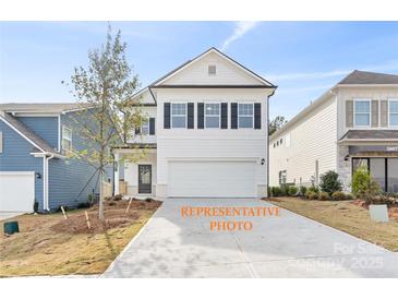 Charming two-story home with a two car garage and classic black shutters at 1101 Red River Dr, Salisbury, NC 28144