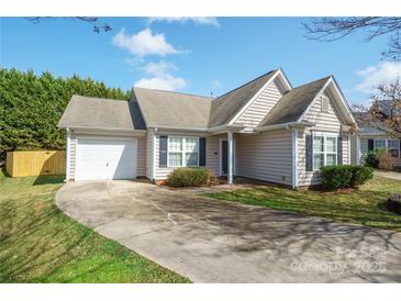 Charming single-story home with a well-manicured lawn, driveway, and attached one-car garage at 2007 Wexford Way, Statesville, NC 28625