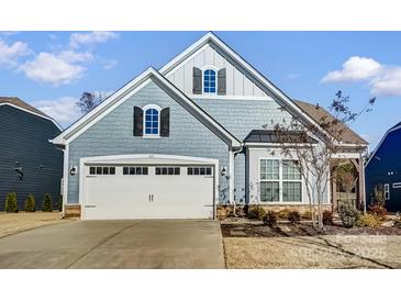 Charming home with a two-car garage and well-manicured landscaping at 427 Kentmere Ln, Lake Wylie, SC 29710