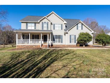 Charming two-story home with a welcoming front porch and well-manicured lawn at 280 Bonaventure Dr, Salisbury, NC 28147