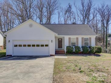 Charming single story home featuring an attached two car garage and well-maintained landscaping at 439 Berwick Dr, Rock Hill, SC 29730