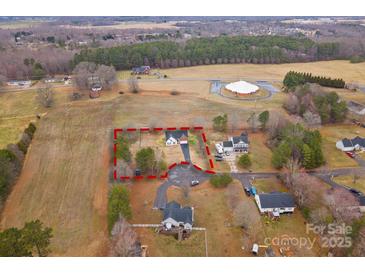 Expansive aerial view showcases the property, its location, and surrounding landscape at 134 Falling Leaf Ln, Statesville, NC 28677