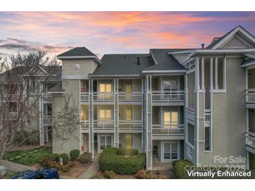 Inviting condo building with multiple floors and private balconies in a beautifully landscaped complex at 18832 Nautical Dr # 44, Cornelius, NC 28031
