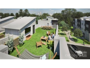 Expansive rooftop patio featuring a synthetic grass lawn, a hammock, and multiple seating areas, perfect for outdoor entertaining at 5007 Nimes Rd # 28, Charlotte, NC 28208