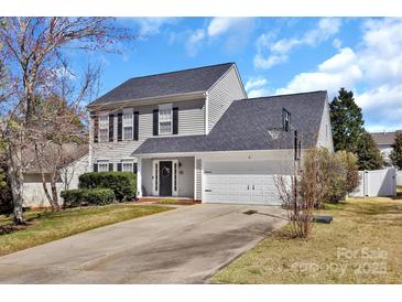 Charming two-story home featuring a two-car garage and well-maintained front lawn at 4007 Hermes Ln, Waxhaw, NC 28173