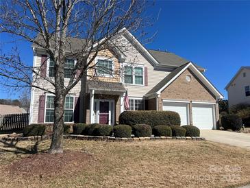 Charming two-story home with a two-car garage and well-maintained landscaping at 252 Legend Dr, Rock Hill, SC 29732