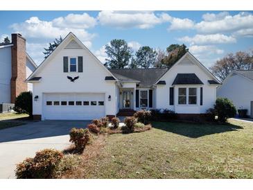 Charming single-Gathering home with a well-manicured front yard and attached two-car garage at 2129 Belle Chase Dr, Rock Hill, SC 29732