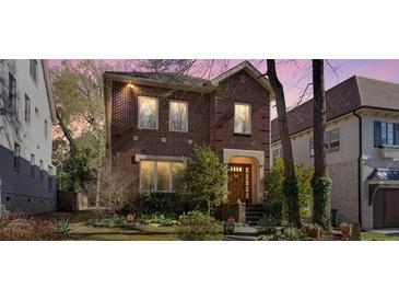 Charming two-story brick home with a well-maintained lawn and inviting entrance at 732 Ellsworth Rd, Charlotte, NC 28211
