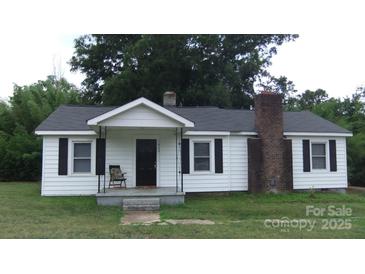 Charming single-story home with white siding, black shutters, and a cozy front porch at 1629 & 1631 Harris St # 6&7, Fort Mill, SC 29708