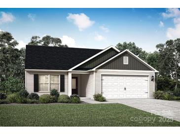 Charming single-story home with a well-manicured lawn and an attached two-car garage at 117 Lightning Dr, Shelby, NC 28152