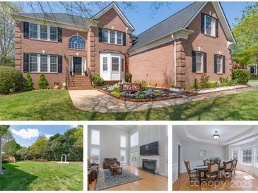 Traditional brick home with manicured lawn and landscaping at 3304 Taviston Dr, Waxhaw, NC 28173