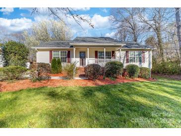 Charming single-story home with manicured lawn and inviting front porch, a perfect cozy retreat at 1025 Hunter Valley Rd, Shelby, NC 28150
