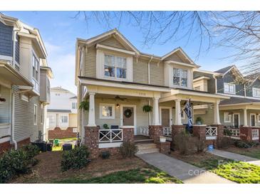 Charming duplex with inviting front porches and well-maintained landscaping at 1335 Summit Greenway Ct, Charlotte, NC 28208