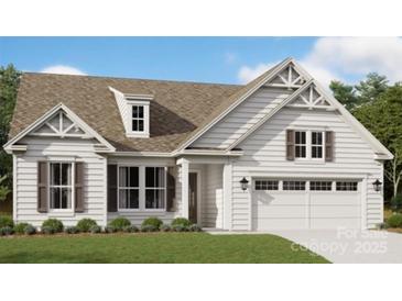 Charming single Gathering home with a two-car garage and beautiful landscaping at 6026 Gray Shadow Ct, York, SC 29745