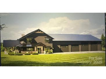 New home with a stone porch and three-car garage on a large grassy lot at 130 Winners Cir # 3, Mooresville, NC 28117